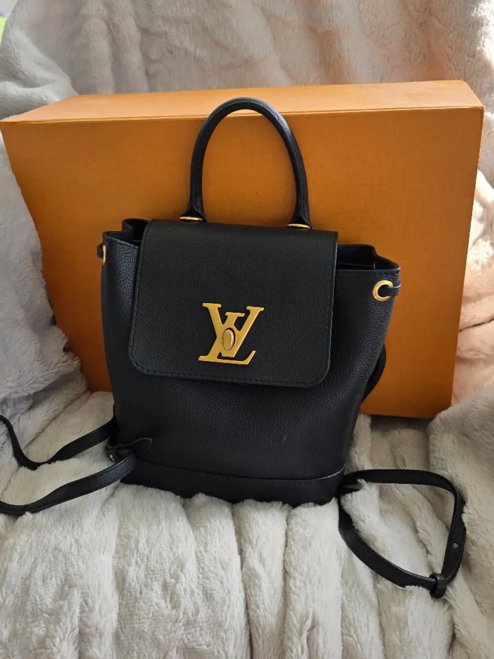 Louis Vuitton Lock Me Mini Backpack